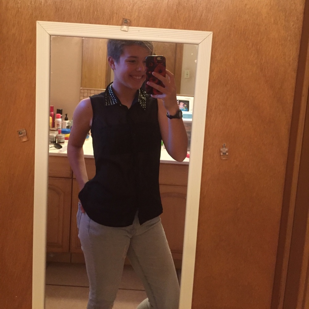 A sleeveless button down